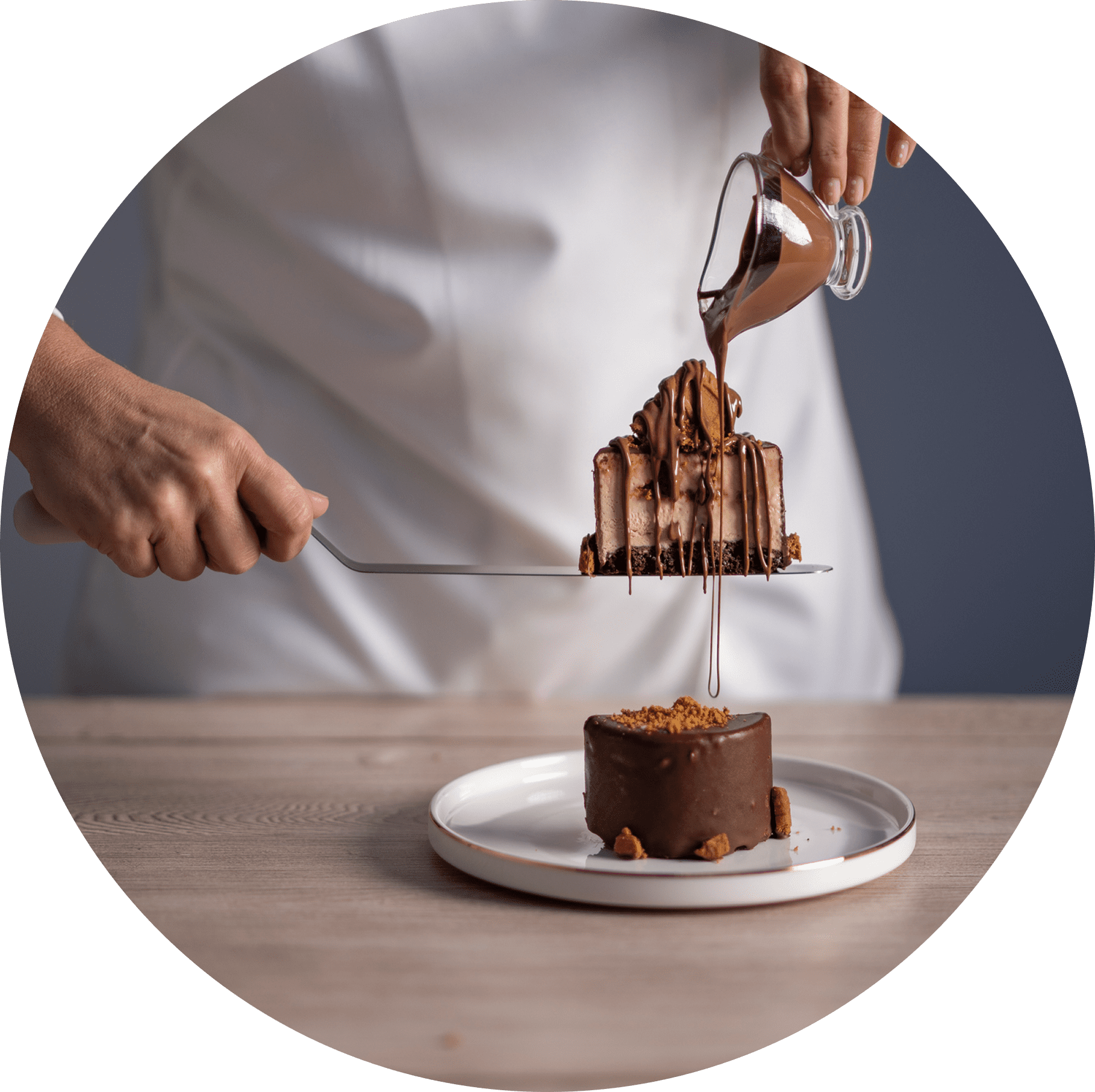 Group 1321317517 (1) Pouring chocolate sauce on a cake slice.
